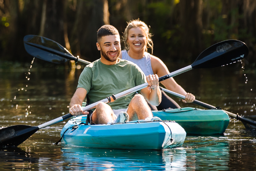 Couple kayaking outdoors