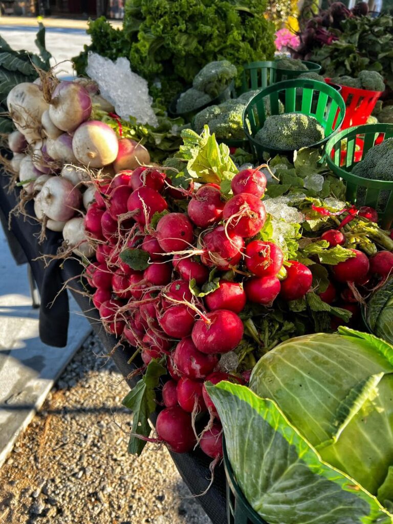 Photo of farm fresh veggies being sold.
