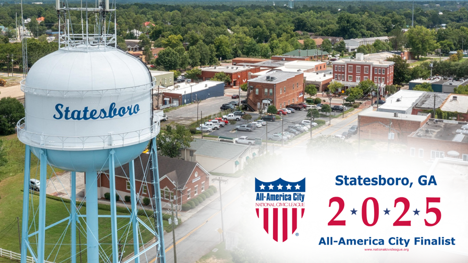 A large white and blue water tower labeled “Statesboro” stands tall over the downtown area of Statesboro, Georgia, with brick buildings and tree-lined streets in view. Overlay text reads: “Statesboro, GA – 2025 All-America City Finalist,” with the logo of the National Civic League’s All-America City award prominently displayed.